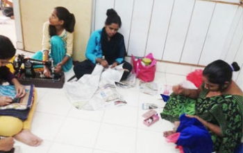 Distribution of sewing machine among poor women